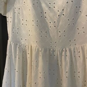 White Dress- comes above the knee- beautiful open back with tie. Only worn once